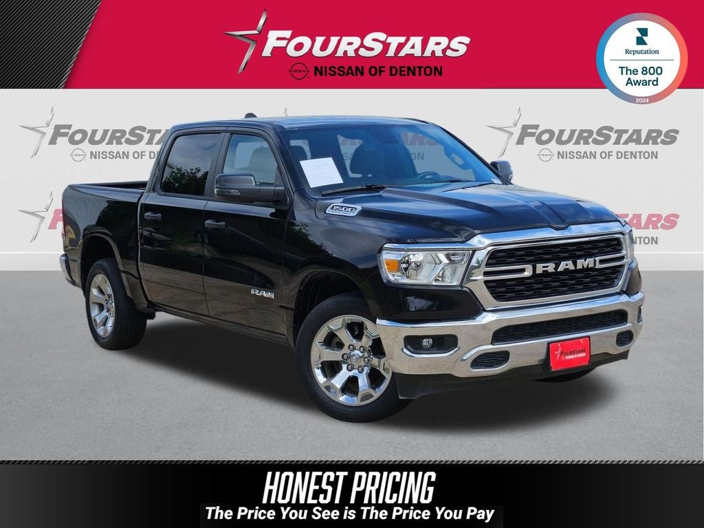 2024 RAM 1500 Big Horn/Lone Star in Diamond Black Crystal Pearlcoat — front three-quarter view