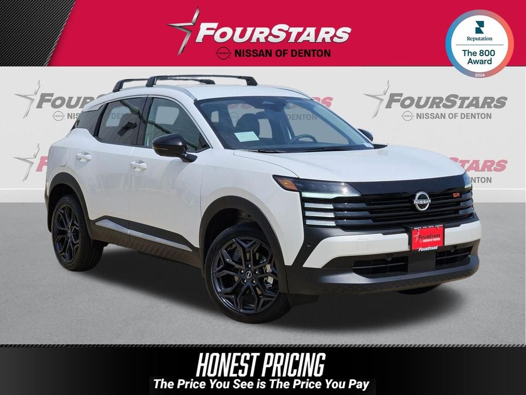 2026 Nissan Kicks SR in Aspen White Tricoat — front three-quarter view