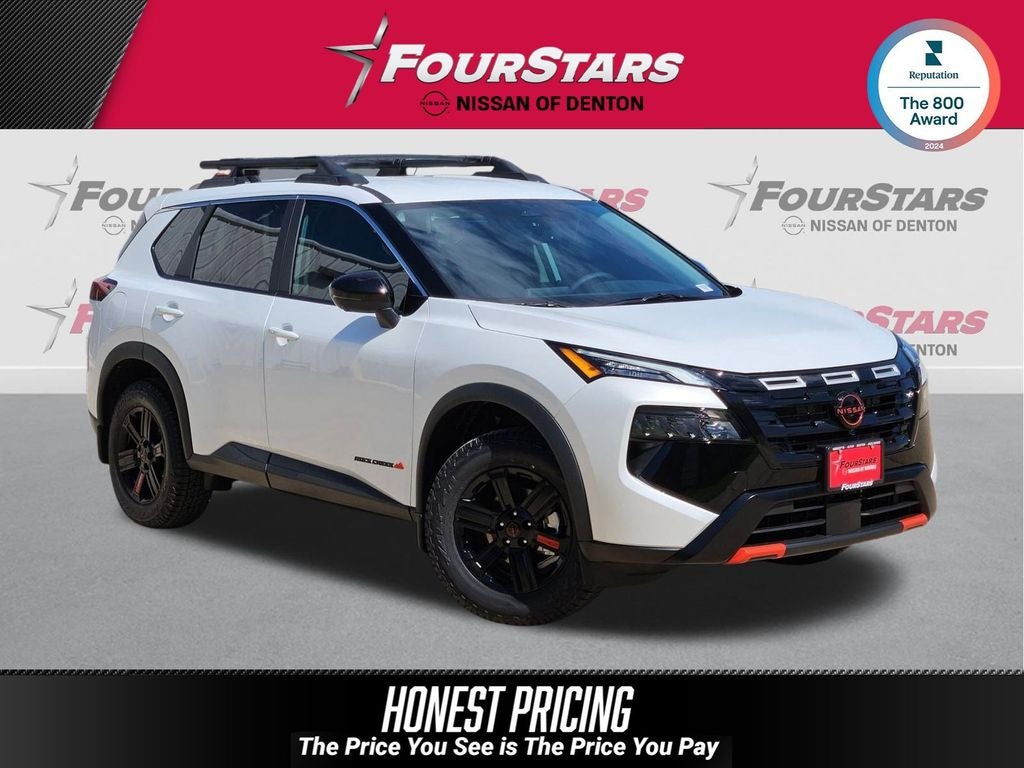 2026 Nissan Rogue Rock Creek in Everest White Pearl Tricoat — front three-quarter view