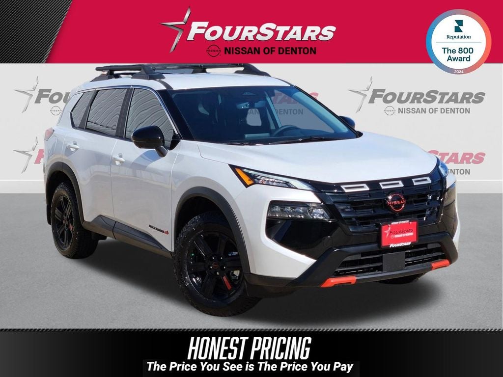 2026 Nissan Rogue Rock Creek in Everest White Pearl Tricoat — front three-quarter view