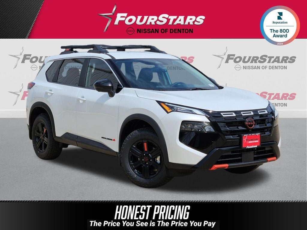 2026 Nissan Rogue Rock Creek in Everest White Pearl Tricoat — front three-quarter view