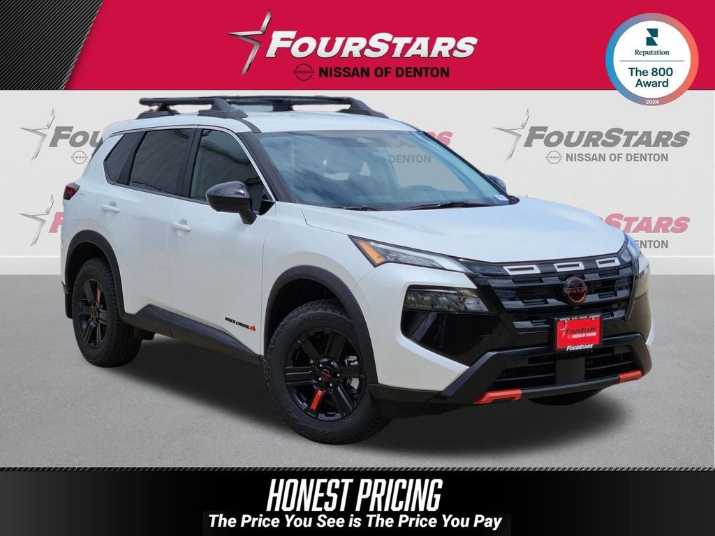 2026 Nissan Rogue Rock Creek in Everest White Pearl Tricoat — front three-quarter view