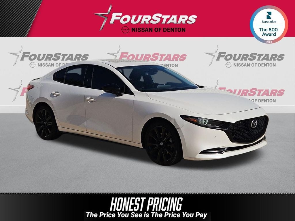 2022 Mazda Mazda3 Premium Plus in Snowflake White Pearl Mica — front three-quarter view
