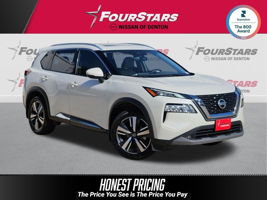 2021 Nissan Rogue SL in Pearl White Tricoat — front three-quarter view