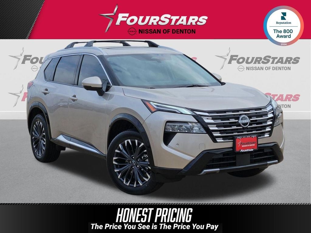 2026 Nissan Rogue Platinum in Champagne Silver Metallic — front three-quarter view